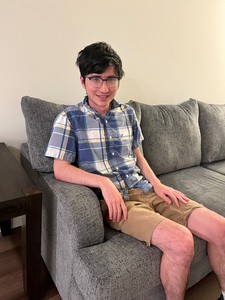 A man sitting on a couch