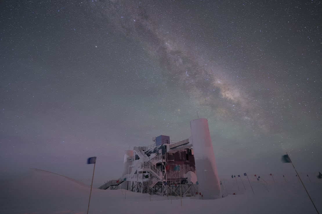 The IceCube Lab with frosted exterior in winter, Milky Way seen overhead.