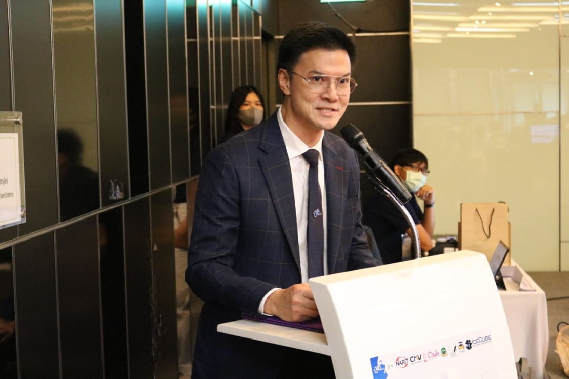 A man speaking at a podium