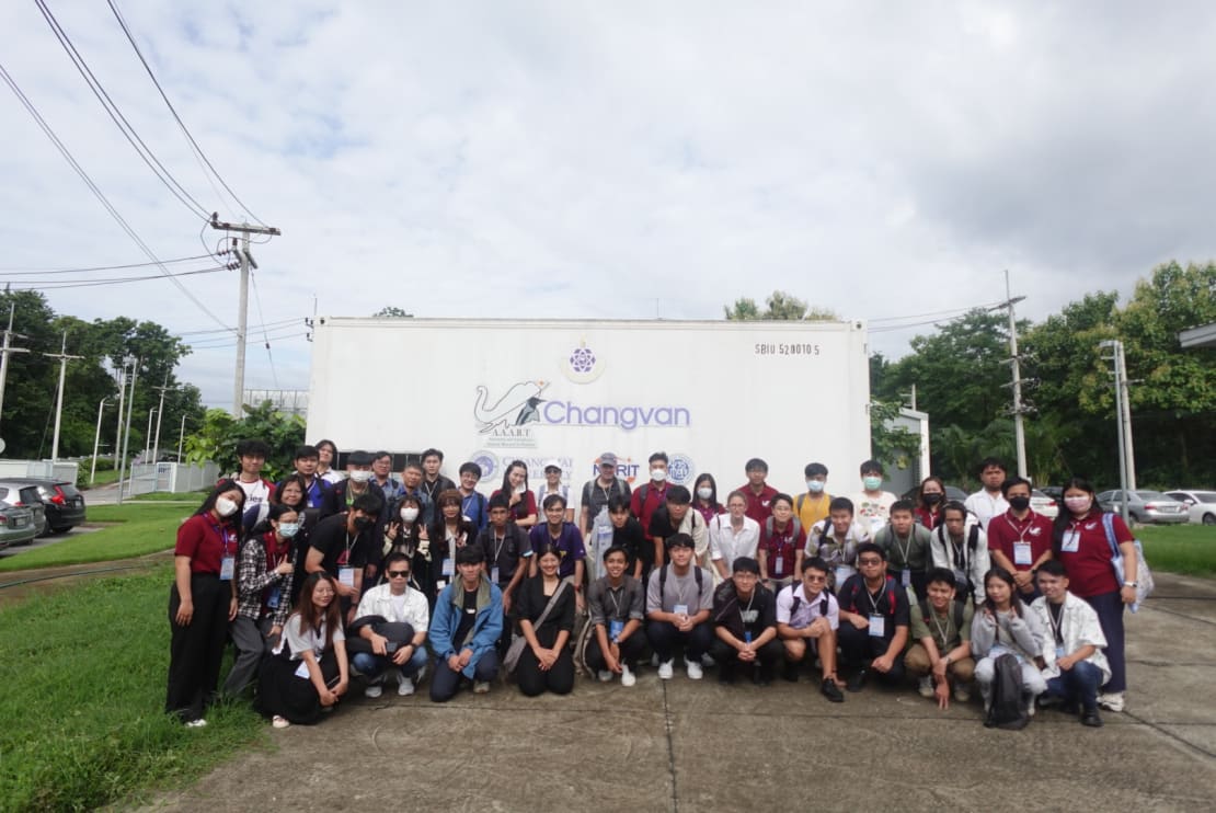 A group of people in front of the mobile neutron detector